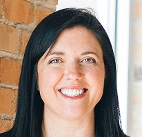 Sophie Hartwell, head of customer support, in a service team portrait